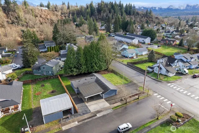 an aerial view of a swimming pool patio and mountain view