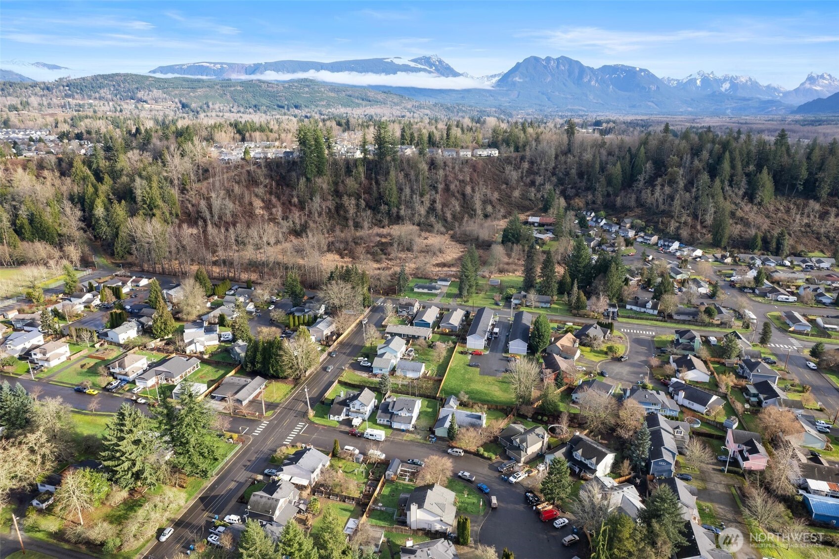 731 High Avenue Sultan, WA 98294 - Photo 34 of 37 a view of a city with mountains in the background