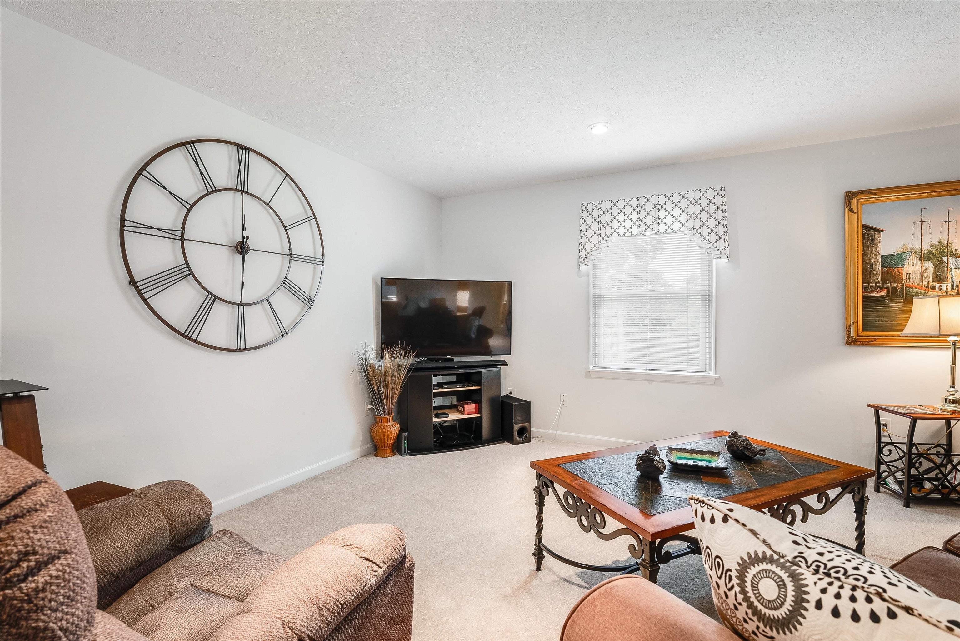 31 Folly Mills Station Road Staunton, VA 24401 - Photo 12 of 48 a living room with furniture a flat screen tv and a window