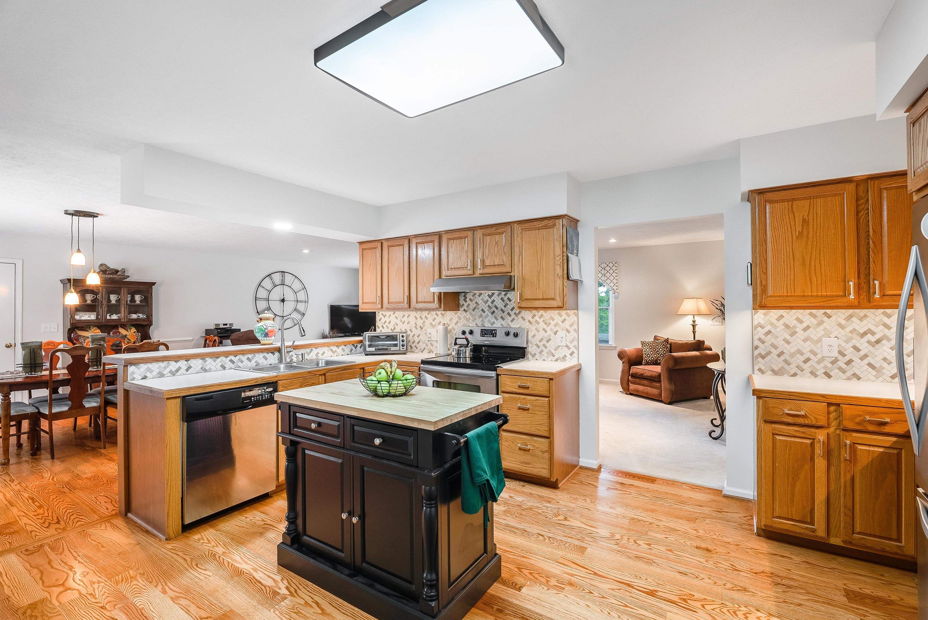 31 Folly Mills Station Road Staunton, VA 24401 - Photo 18 of 48 a kitchen with stainless steel appliances granite countertop a stove and a refrigerator