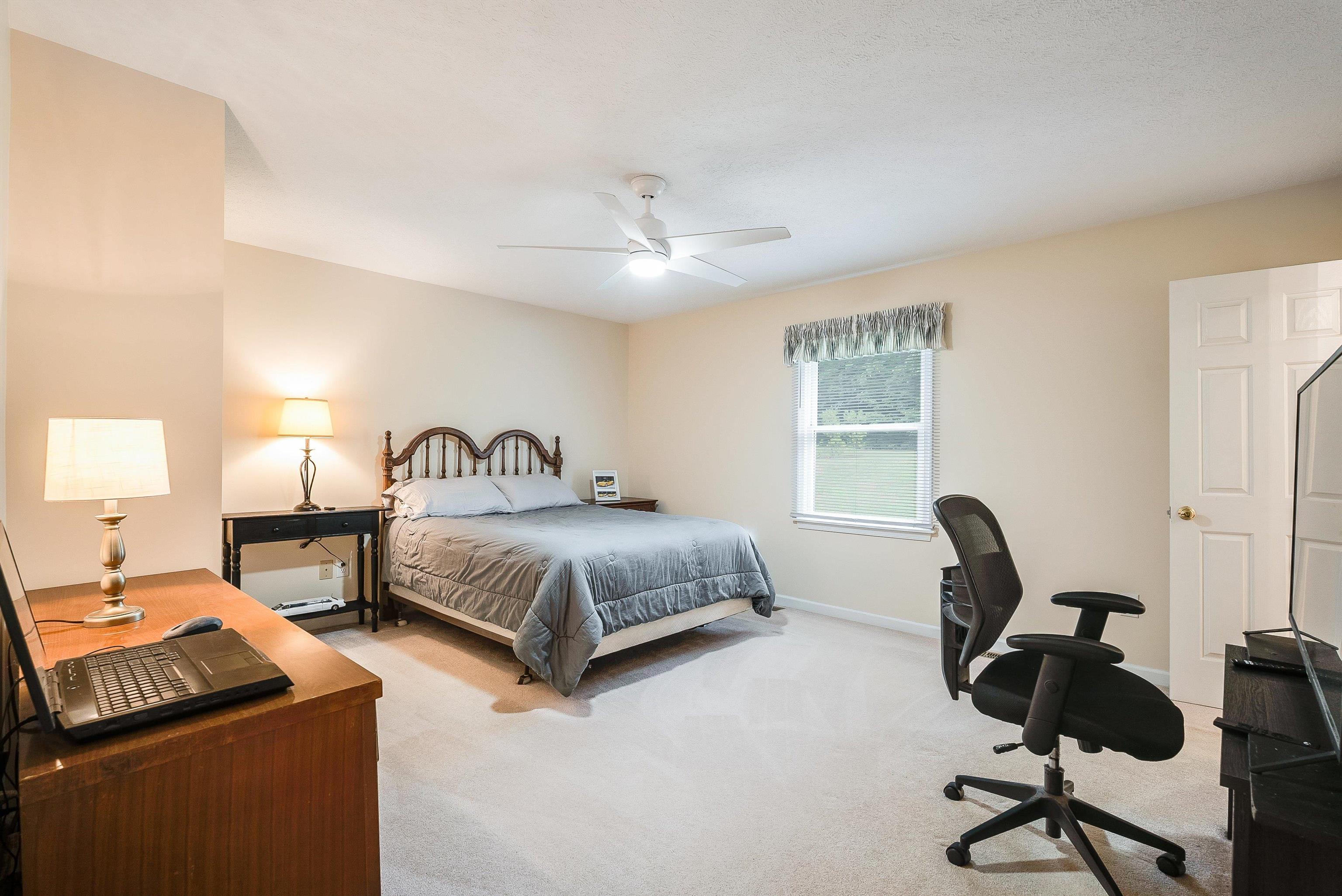 31 Folly Mills Station Road Staunton, VA 24401 - Photo 27 of 48 a bedroom with furniture and a window