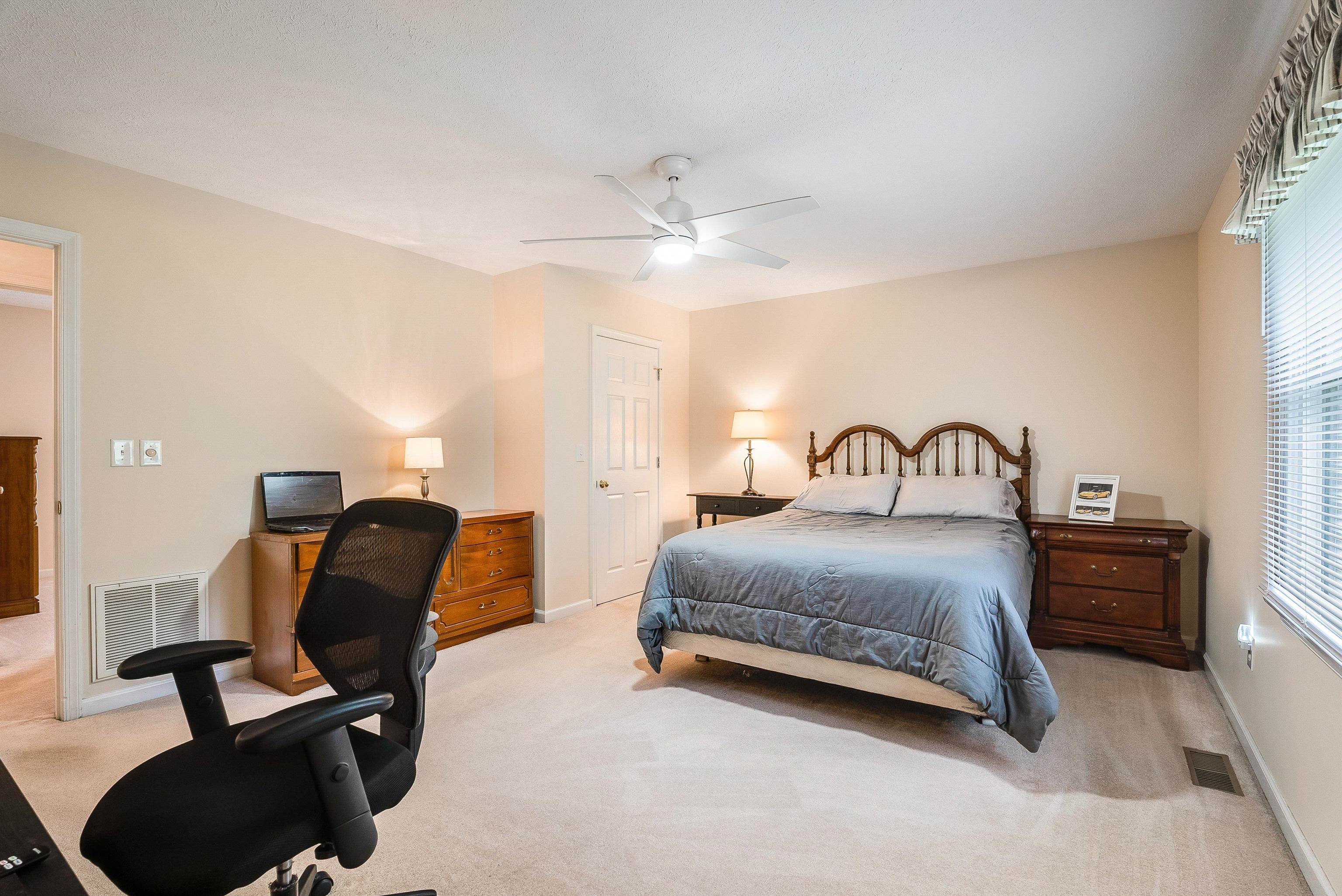 31 Folly Mills Station Road Staunton, VA 24401 - Photo 28 of 48 a bedroom with bed and a chair