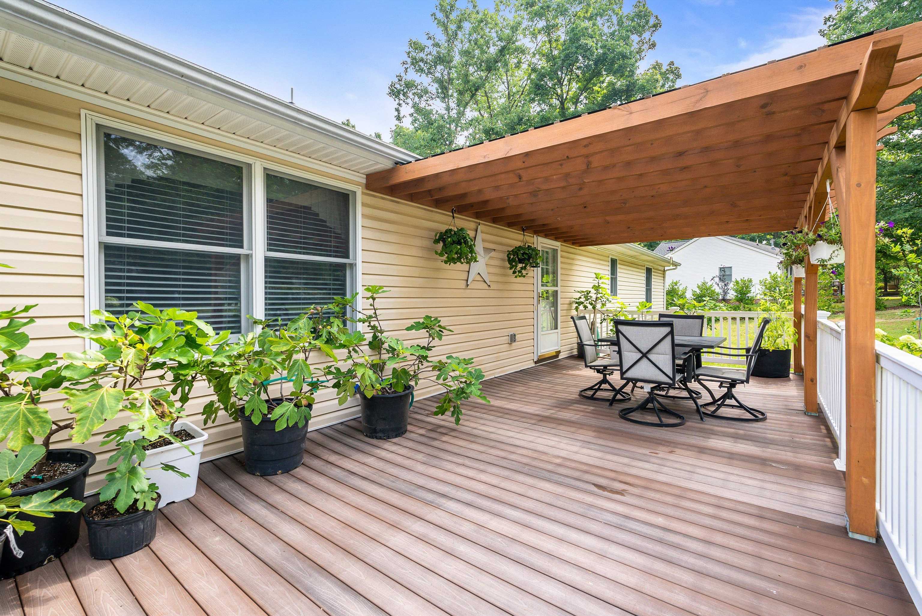 31 Folly Mills Station Road Staunton, VA 24401 - Photo 34 of 48 a view of a chair and table on the wooden deck