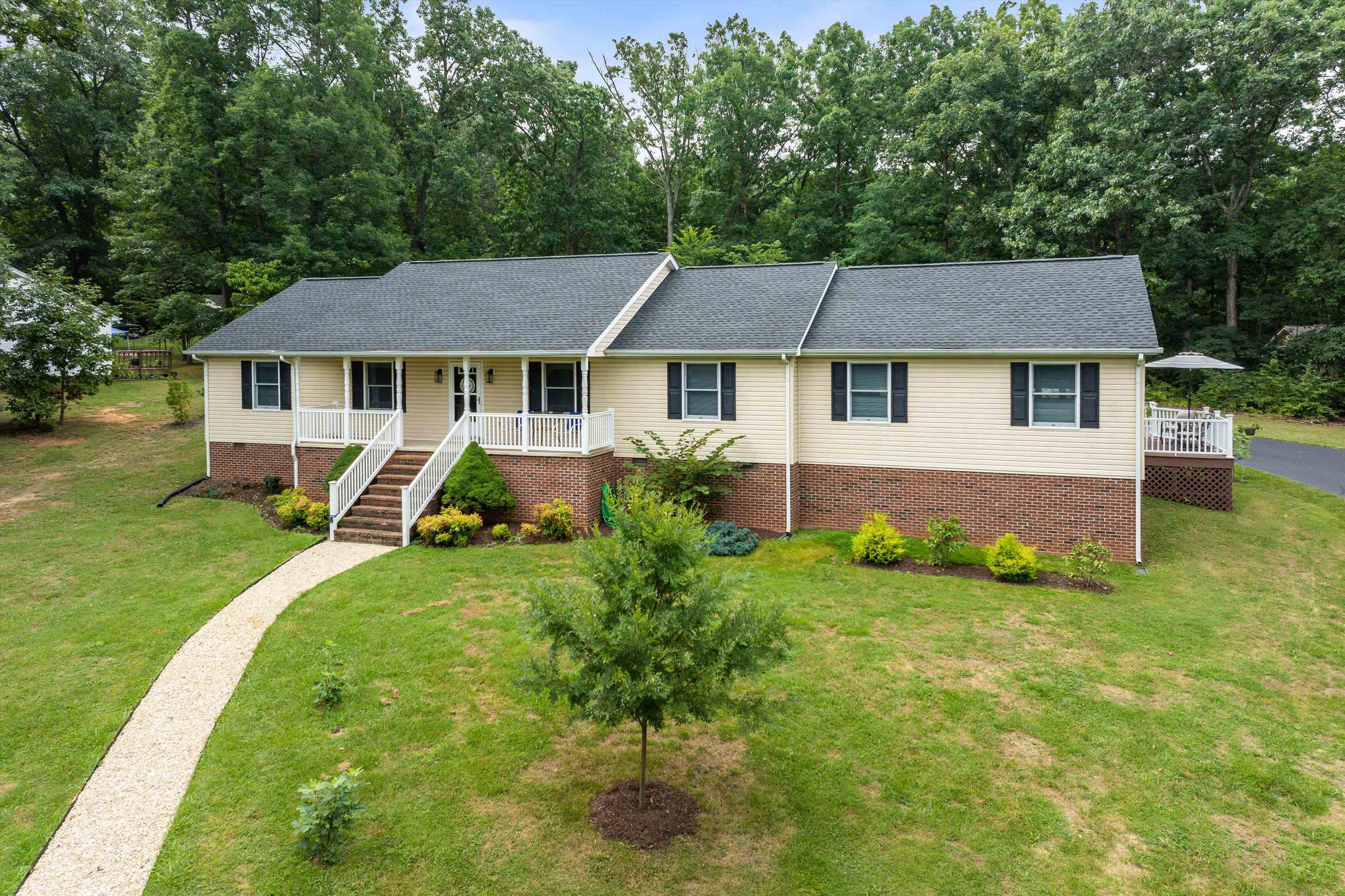 31 Folly Mills Station Road Staunton, VA 24401 - Photo 4 of 48 a house view with a garden space