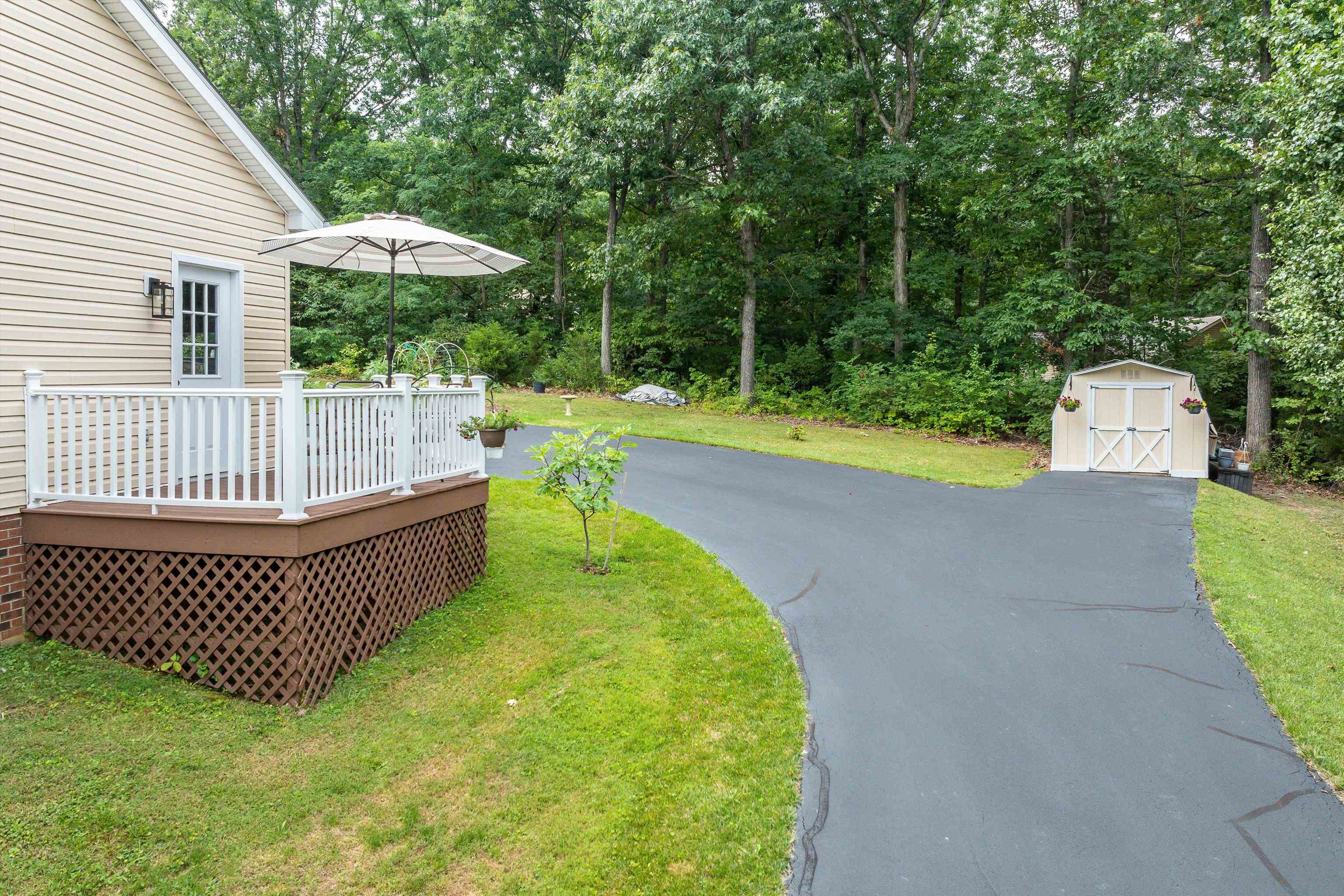 31 Folly Mills Station Road Staunton, VA 24401 - Photo 45 of 48 a view of a patio with a table and chairs