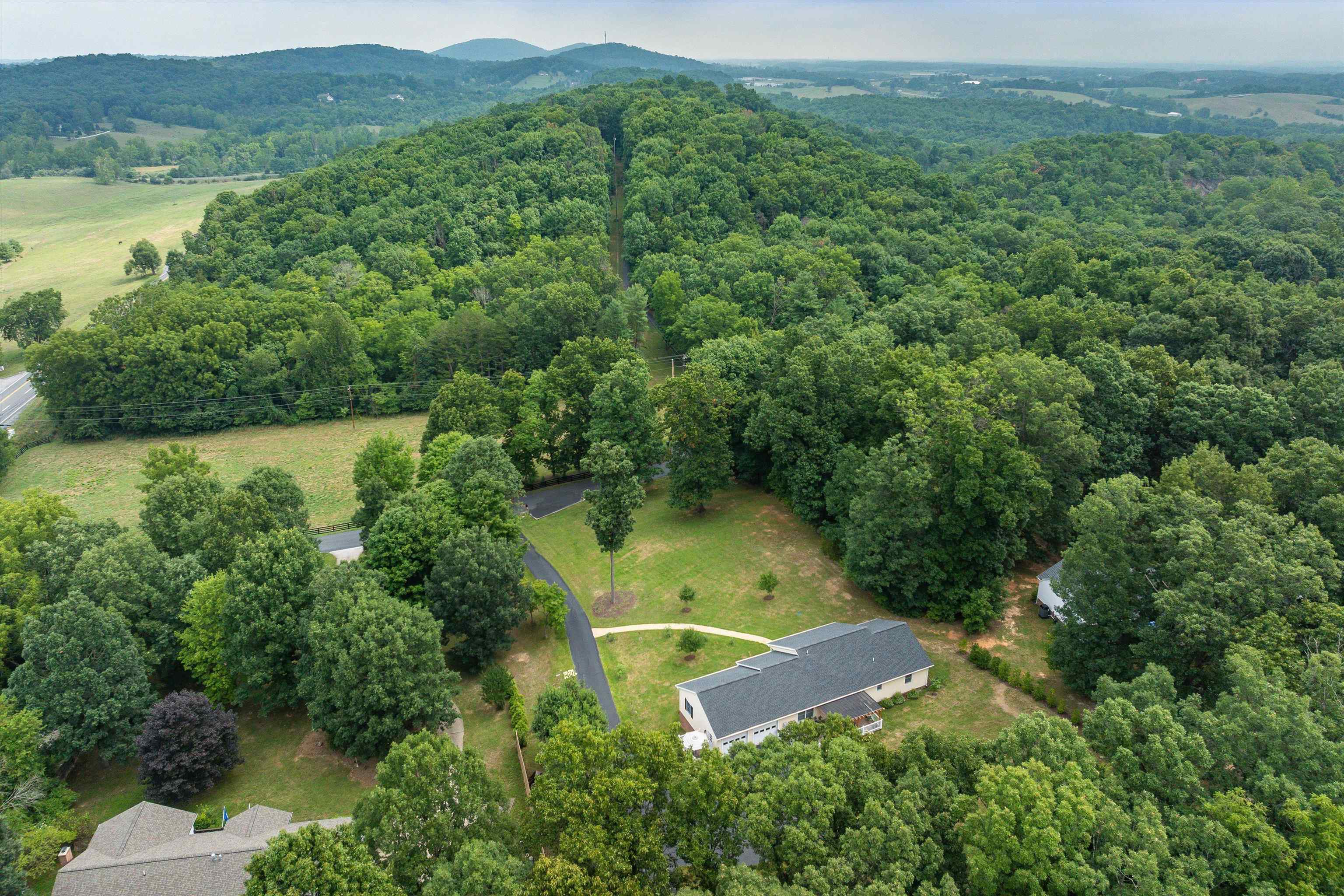 31 Folly Mills Station Road Staunton, VA 24401 - Photo 46 of 48 an aerial view of a house with a yard