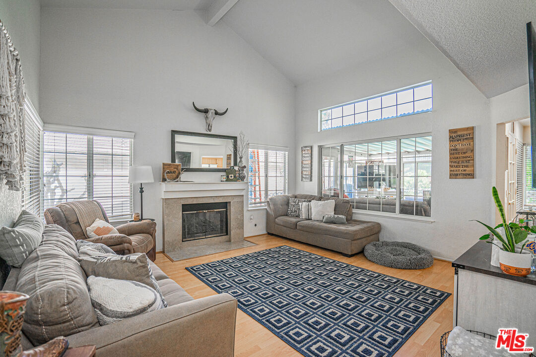 20807 Canyon Ridge Road Diamond Bar, CA 91789 - Photo 3 of 16 a living room with furniture and a fireplace