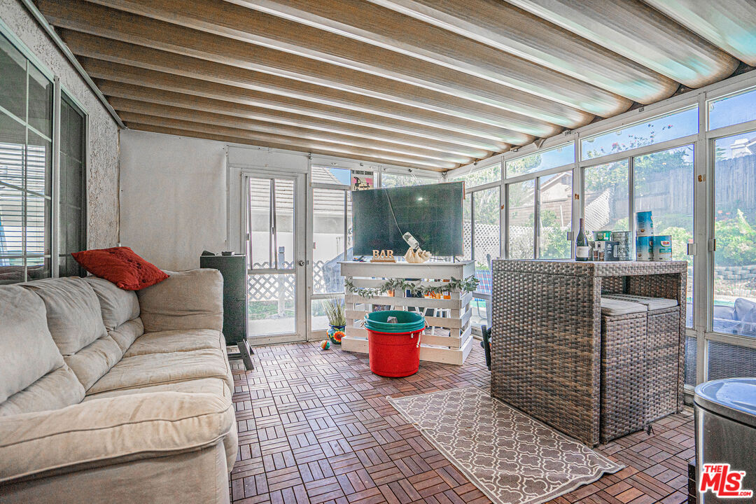 20807 Canyon Ridge Road Diamond Bar, CA 91789 - Photo 6 of 16 a living room with furniture and a potted plant