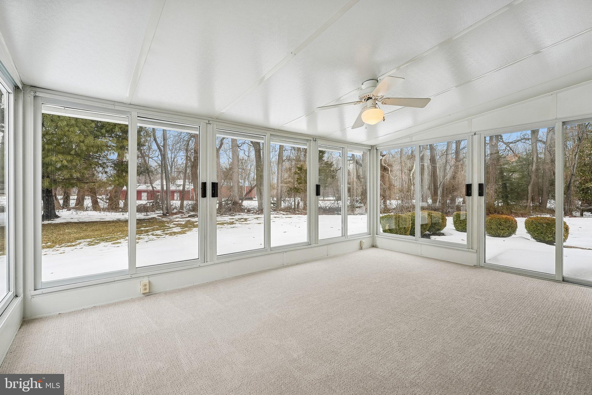 7 Drake Court Mount Laurel, NJ 08054 - Photo 13 of 33 Bright sunroom with serene outdoor views.