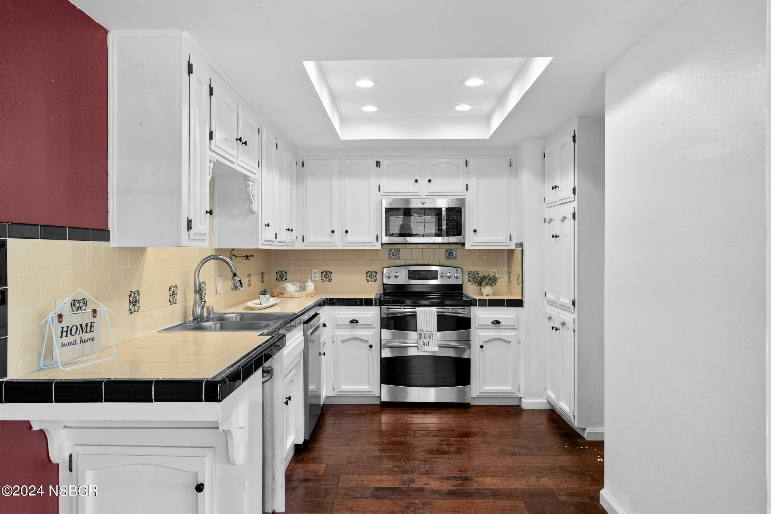 1113 James Way Arroyo Grande, CA 93420 - Photo 11 of 30 a kitchen with stainless steel appliances a sink stove and cabinets