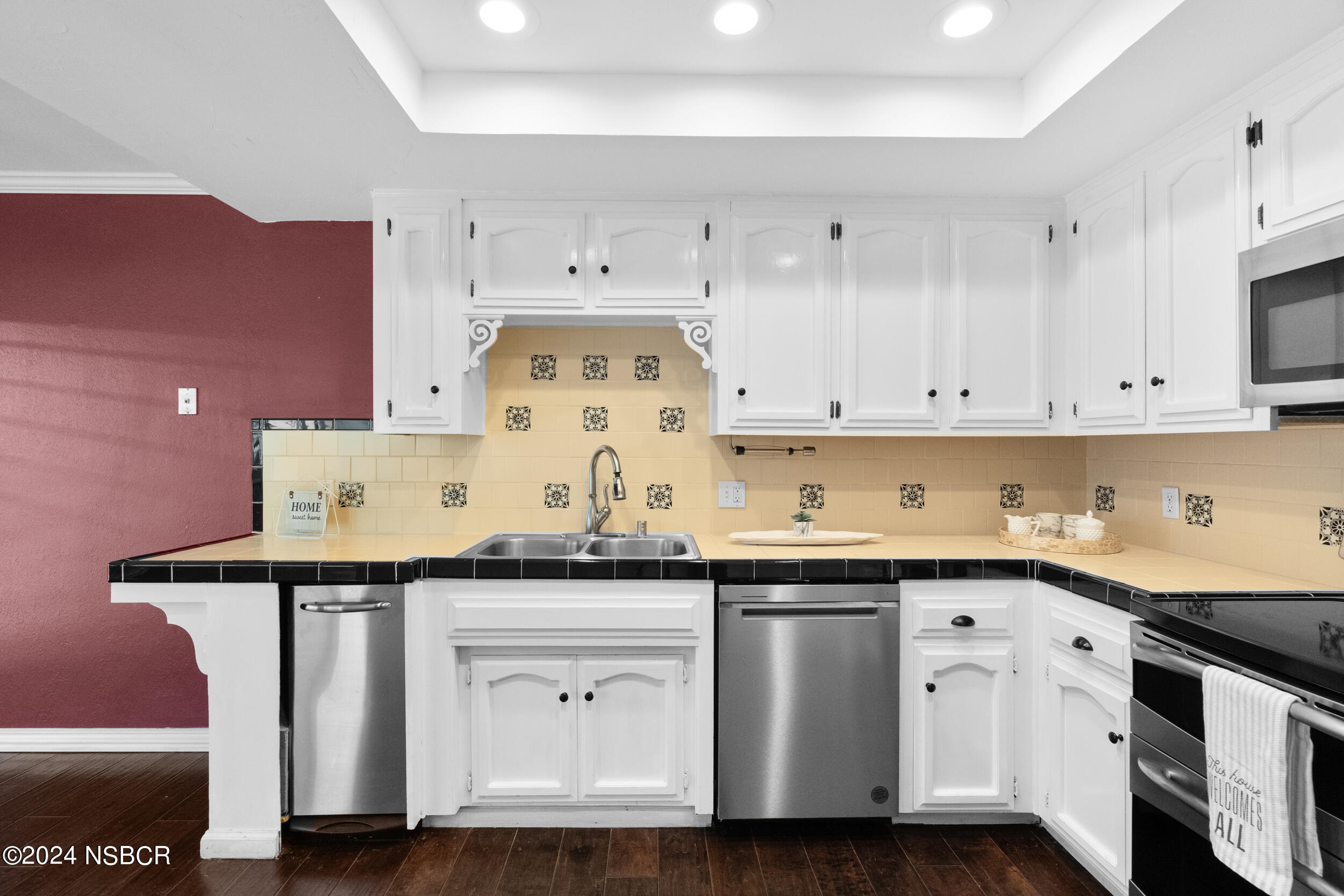 1113 James Way Arroyo Grande, CA 93420 - Photo 13 of 30 a kitchen with granite countertop a sink cabinets and stainless steel appliances