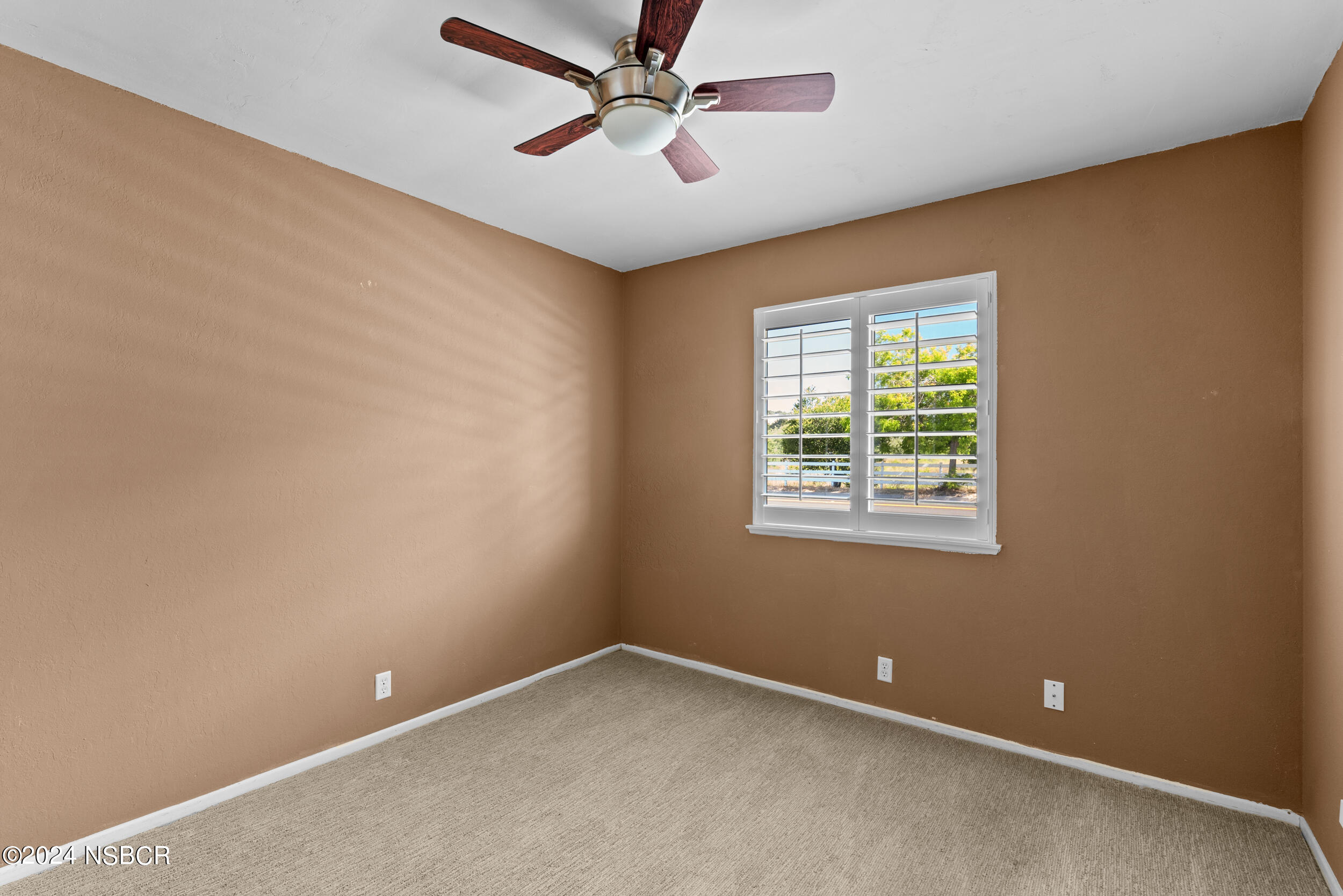 1113 James Way Arroyo Grande, CA 93420 - Photo 14 of 30 an empty room with a window and a fan