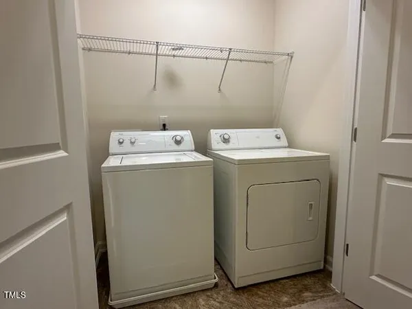 a bathroom with a granite countertop sink toilet a large mirror a bathtub and shower