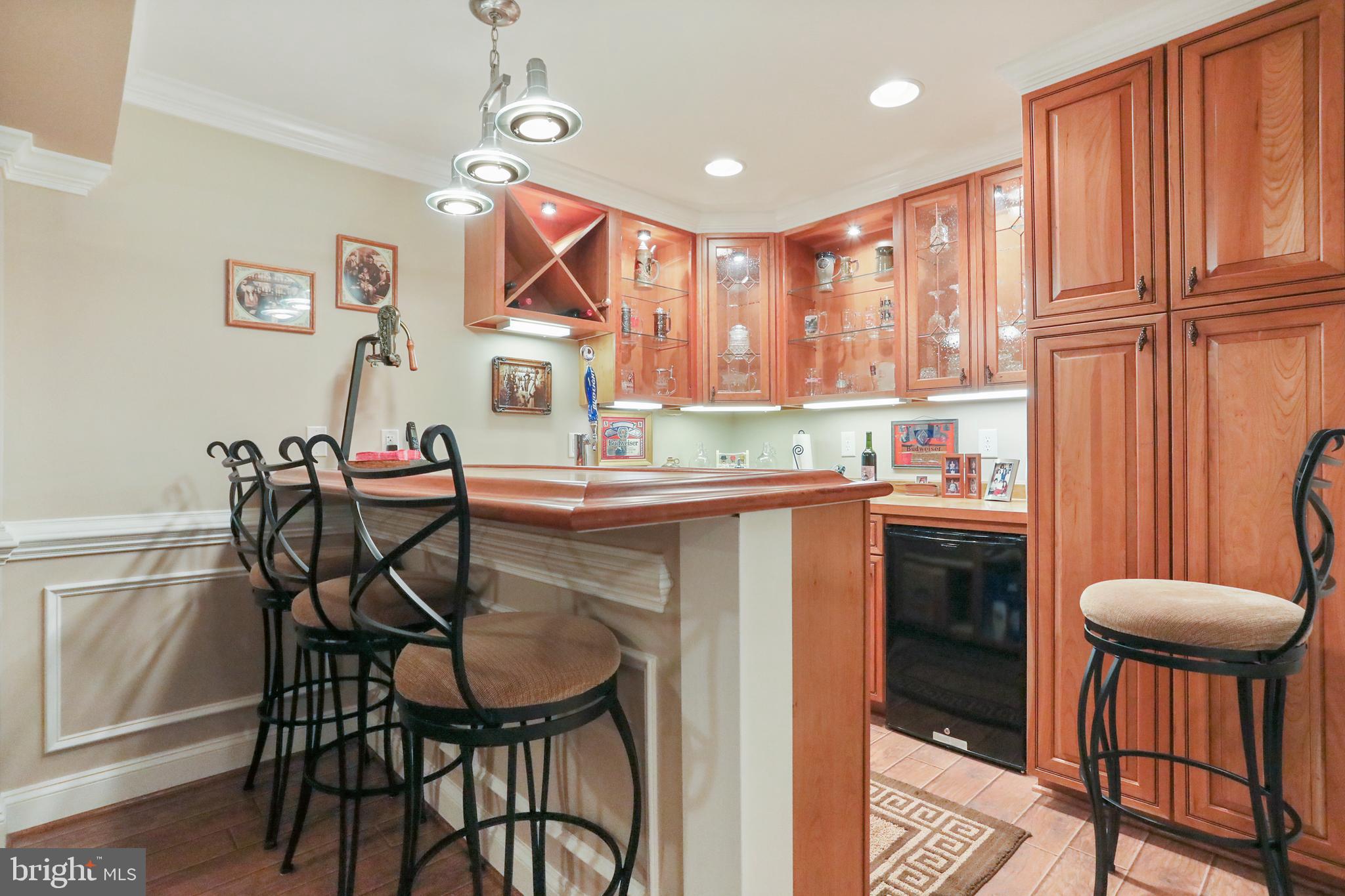 303 Bluff Road Strasburg, VA 22657 - Photo 33 of 65 Custom wet bar with kegerator and custom cabinets