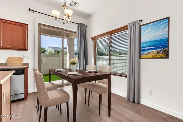 a bedroom with a large bed and a large window