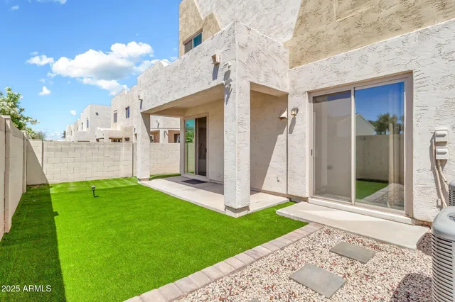 a view of a backyard with garden