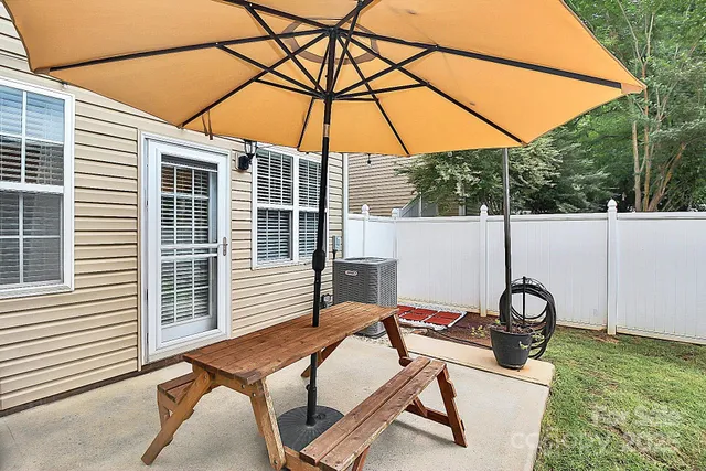 a backyard of a house with seating space