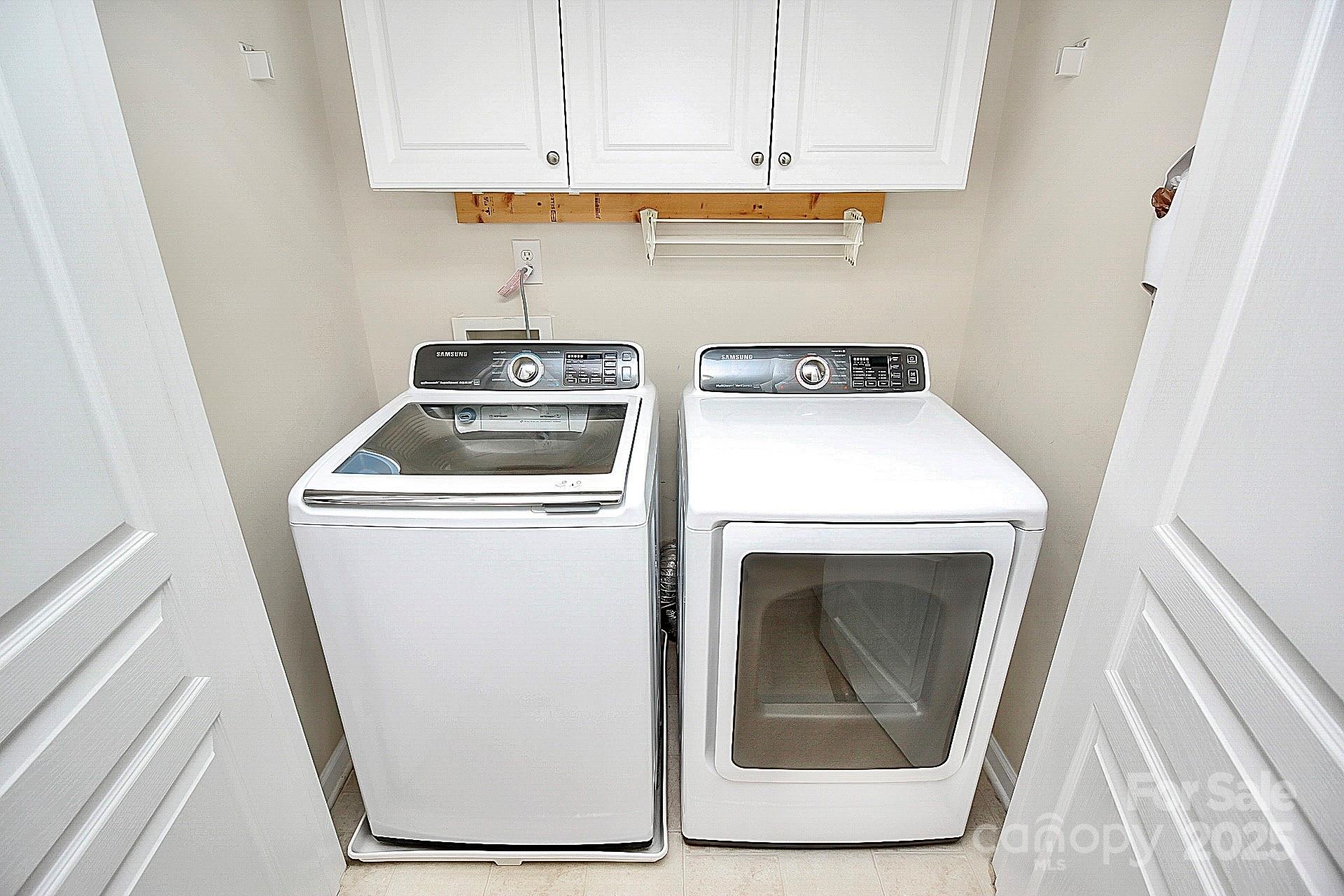 10008 Caldwell Depot Road Cornelius, NC 28031 - Photo 30 of 33 a utility room with dryer and washer