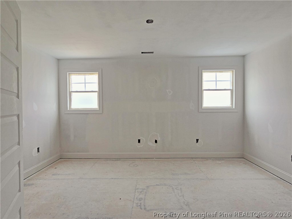 2650 Norrington Road Lillington, NC 27546 - Photo 14 of 24 a view of an empty room with window