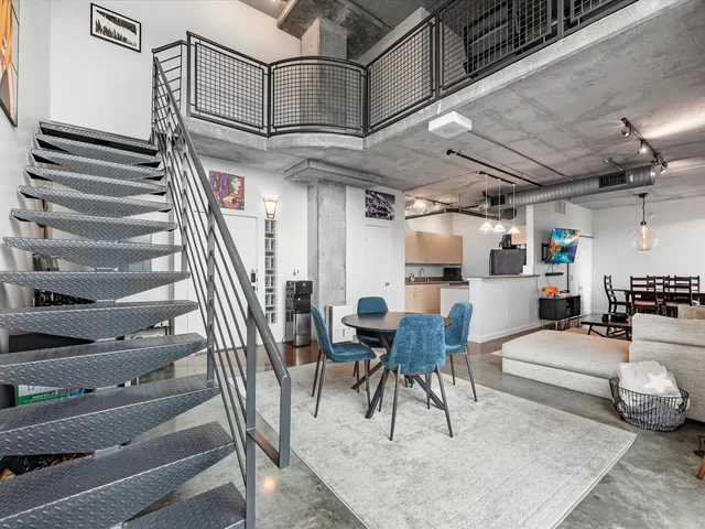 a view of a swimming pool from a balcony