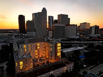 a view of a patio with table and chairs and potted plants
