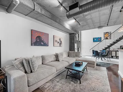 a kitchen with stainless steel appliances granite countertop a stove and a sink