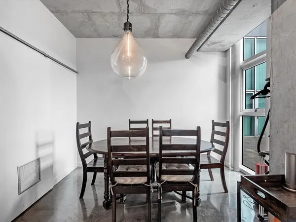 a view of a dining room with furniture
