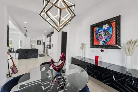 a view of a dining room with furniture