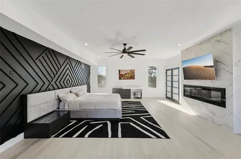 a view of a house with swimming pool yard and patio