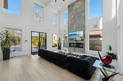 a living room with furniture window and a lamp