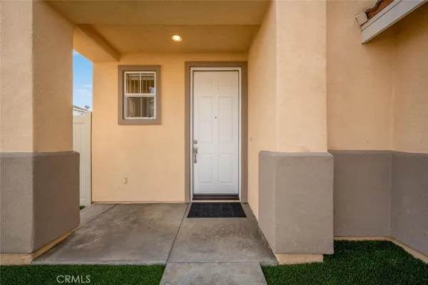 a kitchen with microwave cabinets and stove top oven