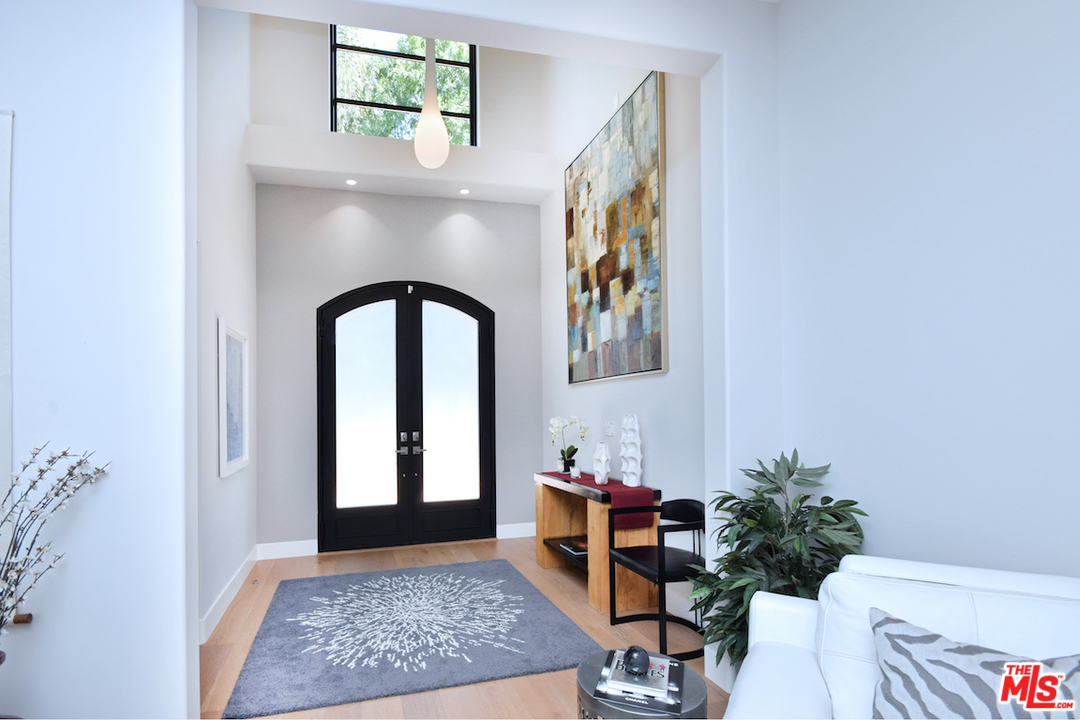14520 Greenleaf Street Sherman Oaks, CA 91403 - Photo 14 of 54 a living room with furniture and a potted plant