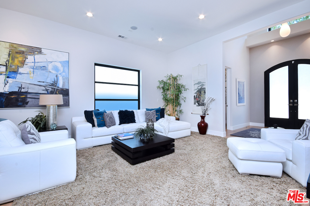 14520 Greenleaf Street Sherman Oaks, CA 91403 - Photo 15 of 54 a living room with furniture and a large window