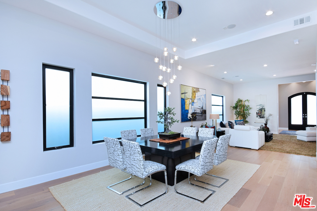 14520 Greenleaf Street Sherman Oaks, CA 91403 - Photo 17 of 54 a living room with furniture and a large window