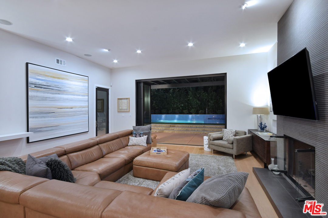 14520 Greenleaf Street Sherman Oaks, CA 91403 - Photo 18 of 54 a living room with furniture and a flat screen tv