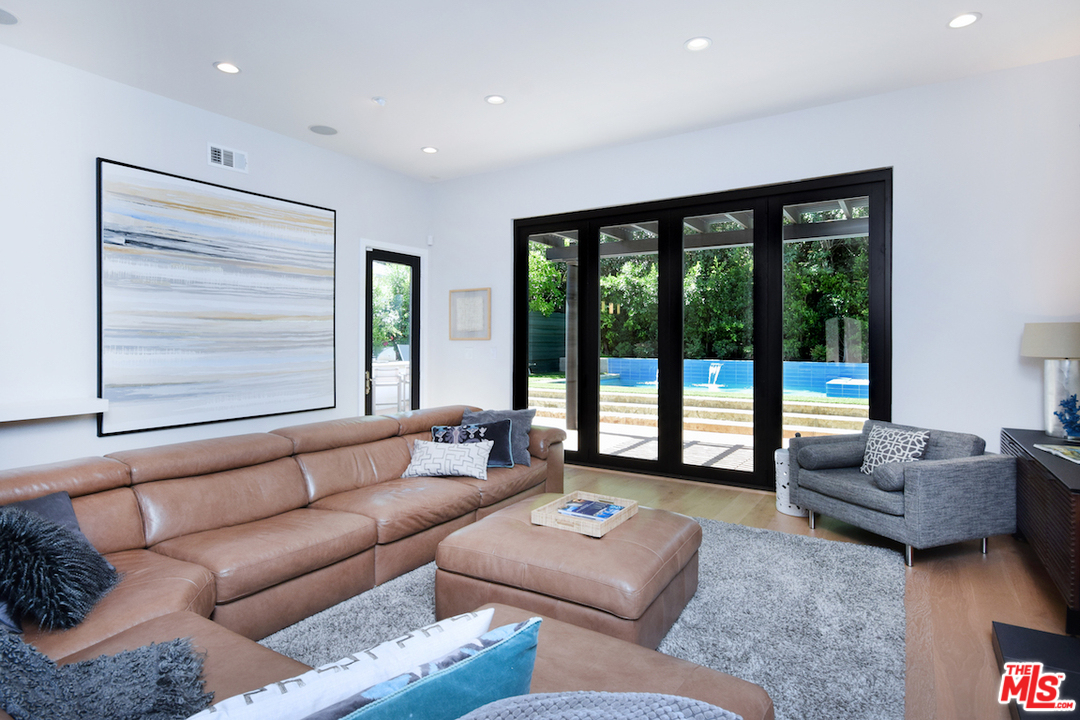 14520 Greenleaf Street Sherman Oaks, CA 91403 - Photo 20 of 54 a living room with furniture and a large window