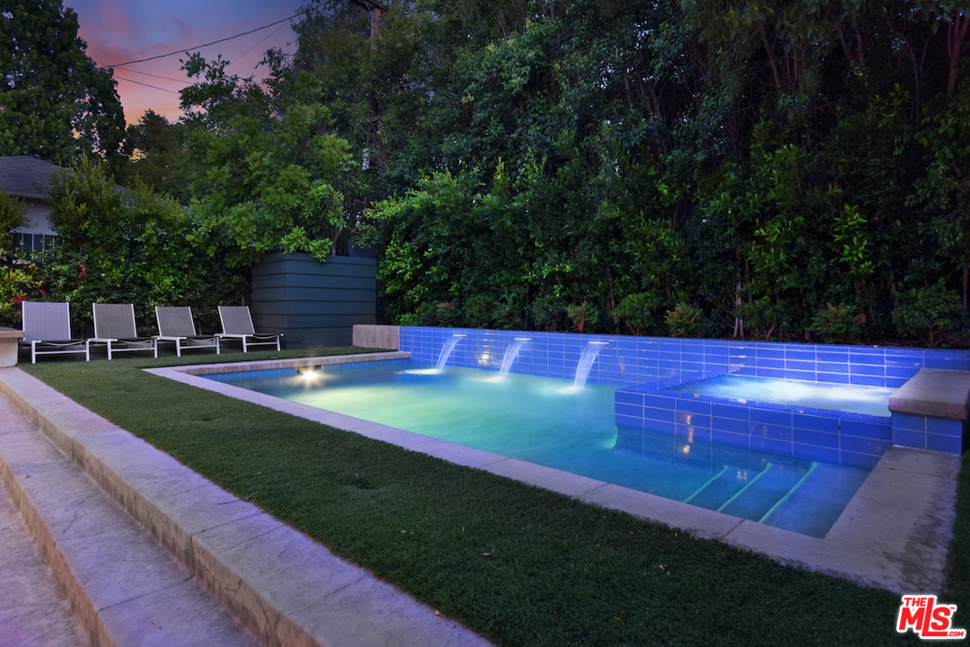 14520 Greenleaf Street Sherman Oaks, CA 91403 - Photo 22 of 54 a view of yard with swimming pool and green space
