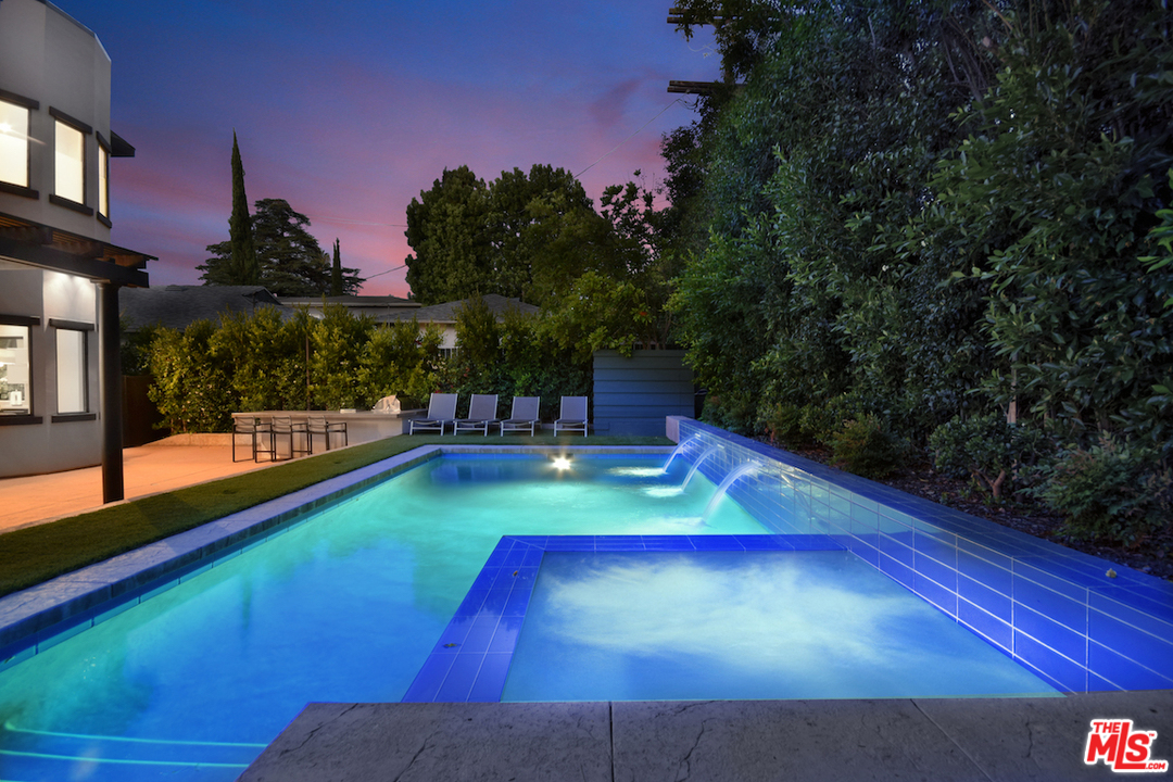 14520 Greenleaf Street Sherman Oaks, CA 91403 - Photo 24 of 54 a view of an outdoor space with a swimming pool