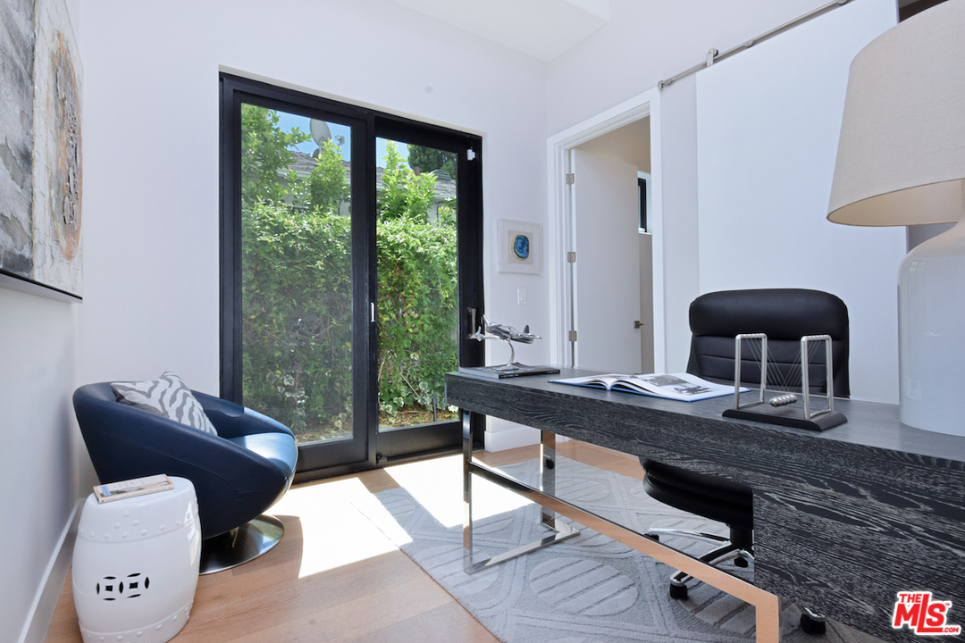 14520 Greenleaf Street Sherman Oaks, CA 91403 - Photo 37 of 54 a living room with furniture and a window