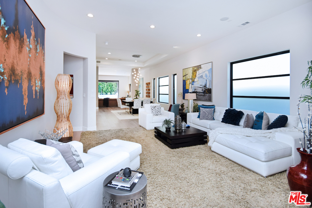 14520 Greenleaf Street Sherman Oaks, CA 91403 - Photo 5 of 54 a living room with furniture and a flat screen tv
