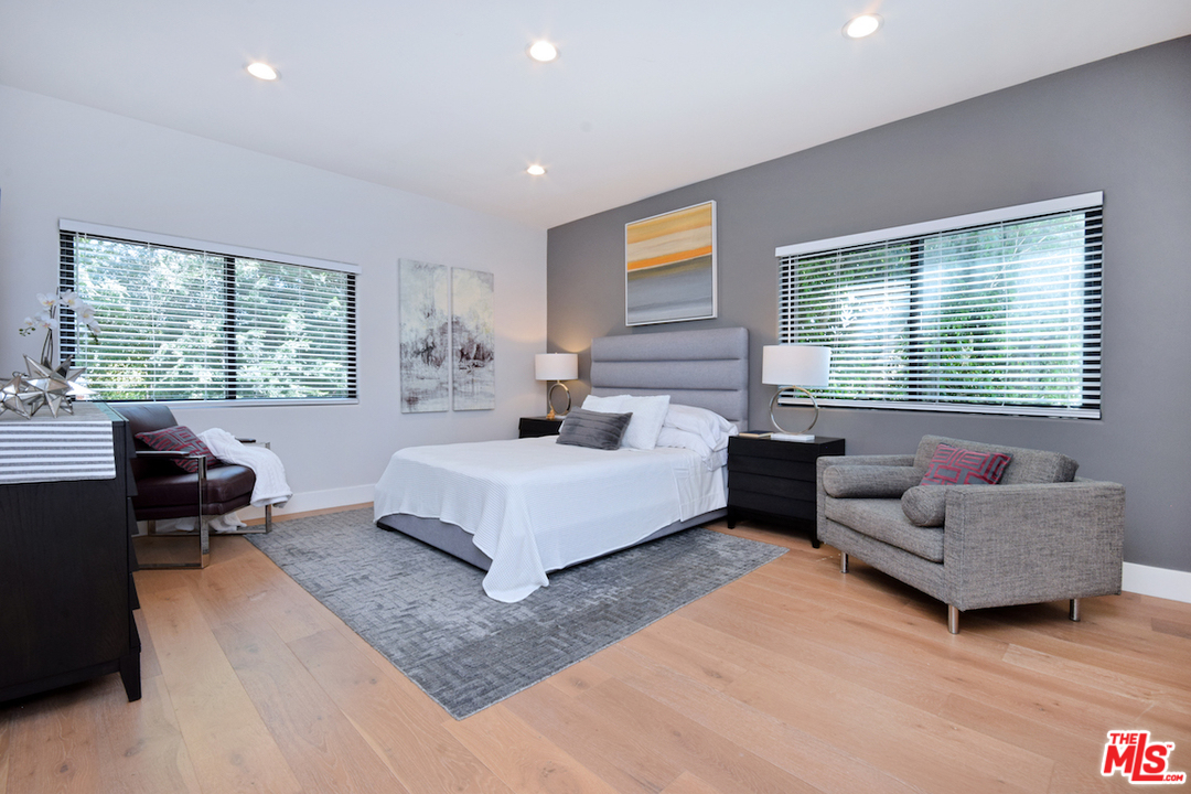 14520 Greenleaf Street Sherman Oaks, CA 91403 - Photo 46 of 54 a bedroom with a bed and a couch