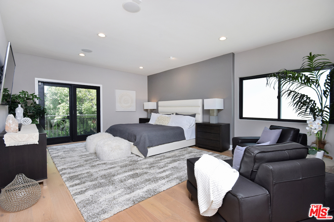 14520 Greenleaf Street Sherman Oaks, CA 91403 - Photo 50 of 54 a bedroom with a bed window and couch