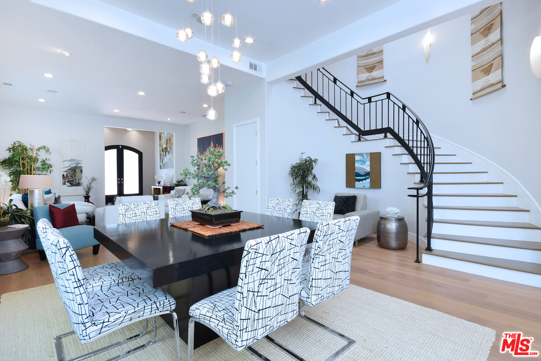 14520 Greenleaf Street Sherman Oaks, CA 91403 - Photo 6 of 54 a living room with furniture and a chandelier
