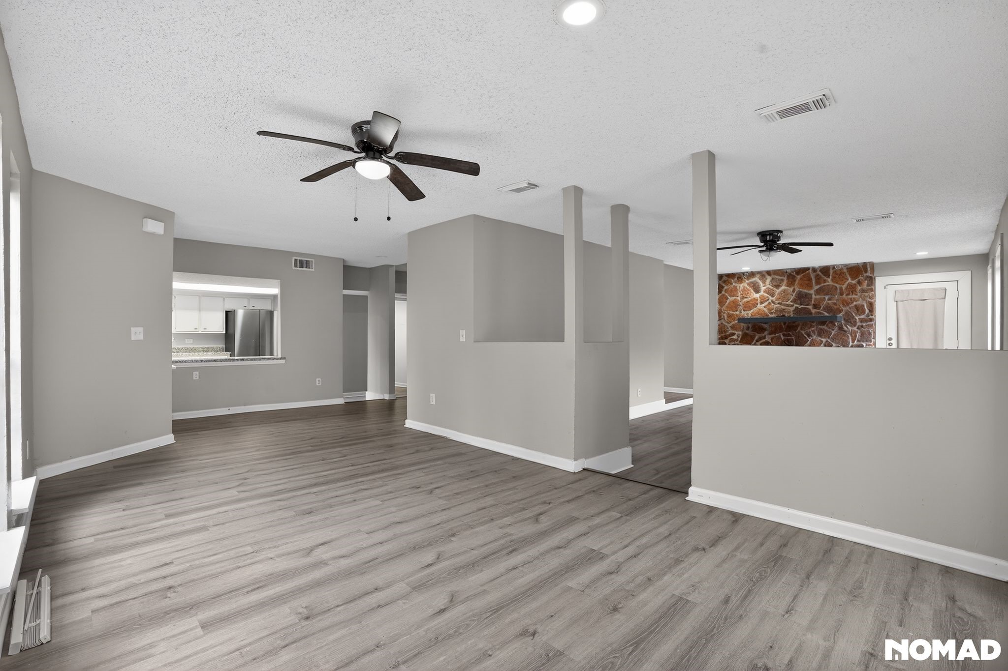 17805 Villa Way Drive Spring, TX 77379 - Photo 15 of 38 a view of an empty room with window and wooden floor