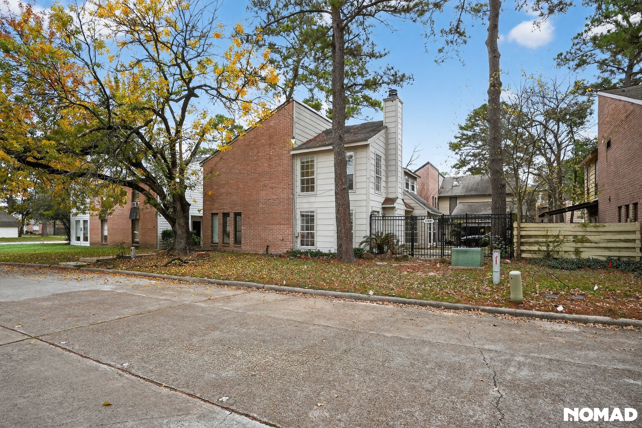 17805 Villa Way Drive Spring, TX 77379 - Photo 2 of 38 a view of a house with a yard and large trees