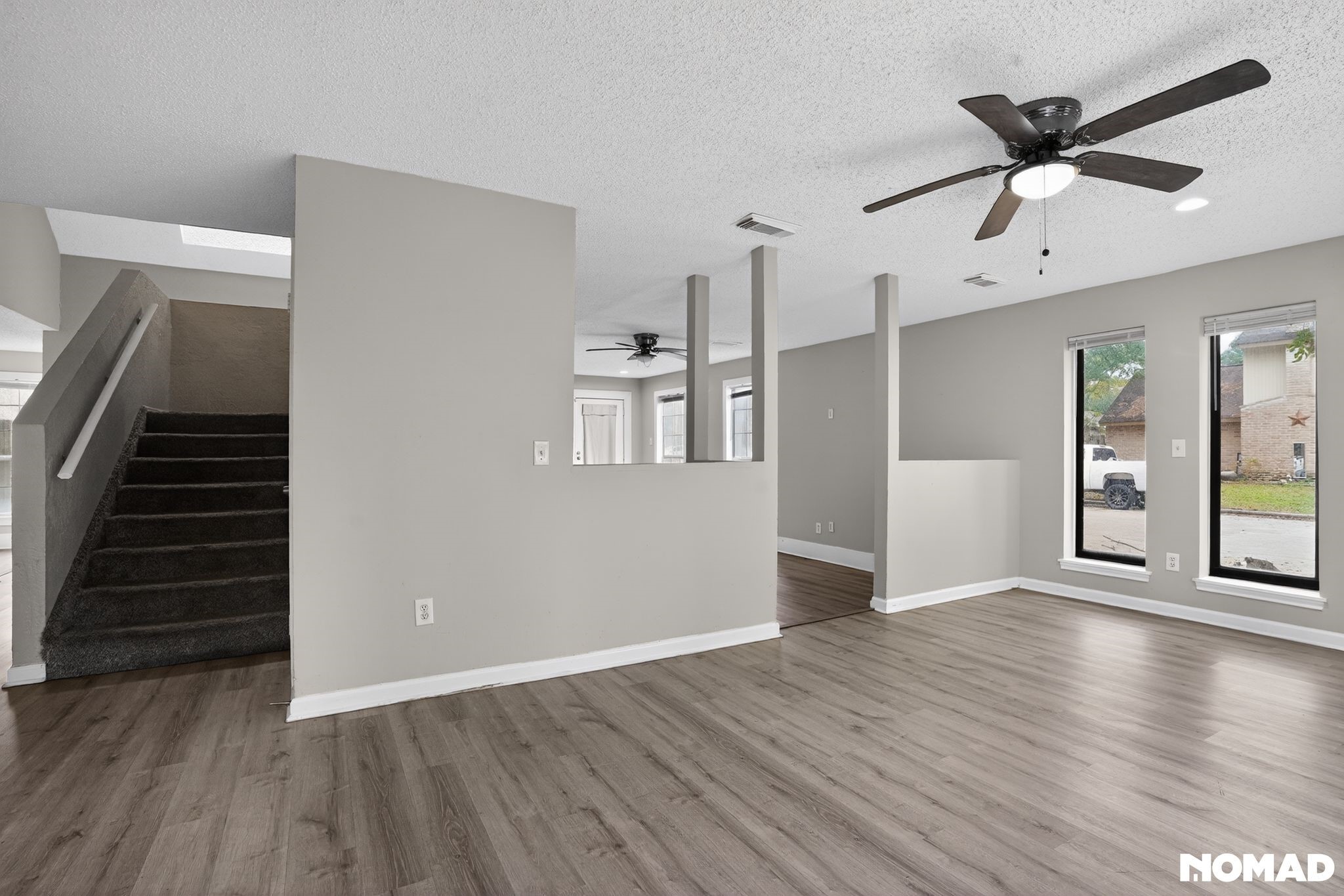 17805 Villa Way Drive Spring, TX 77379 - Photo 23 of 38 a view of an empty room with wooden floor and a window