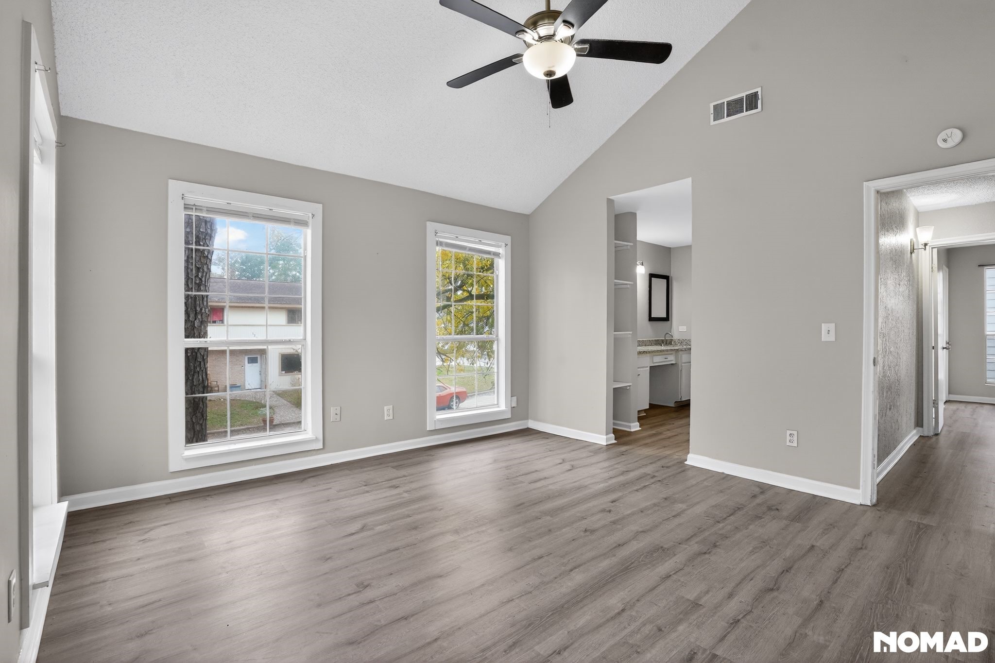 17805 Villa Way Drive Spring, TX 77379 - Photo 24 of 38 a view of an empty room with a window and wooden floor