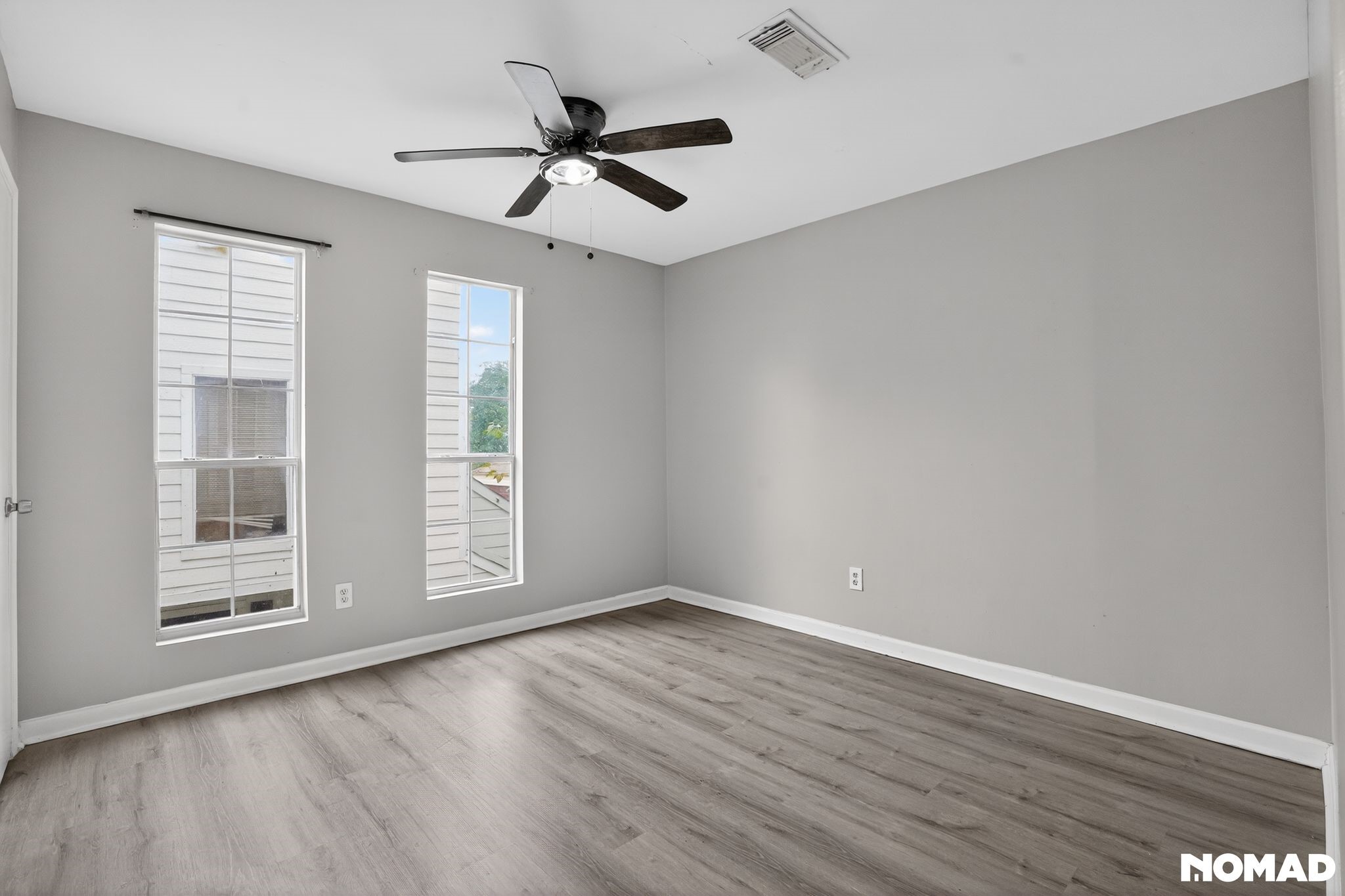 17805 Villa Way Drive Spring, TX 77379 - Photo 25 of 38 a view of empty room with wooden floor and fan