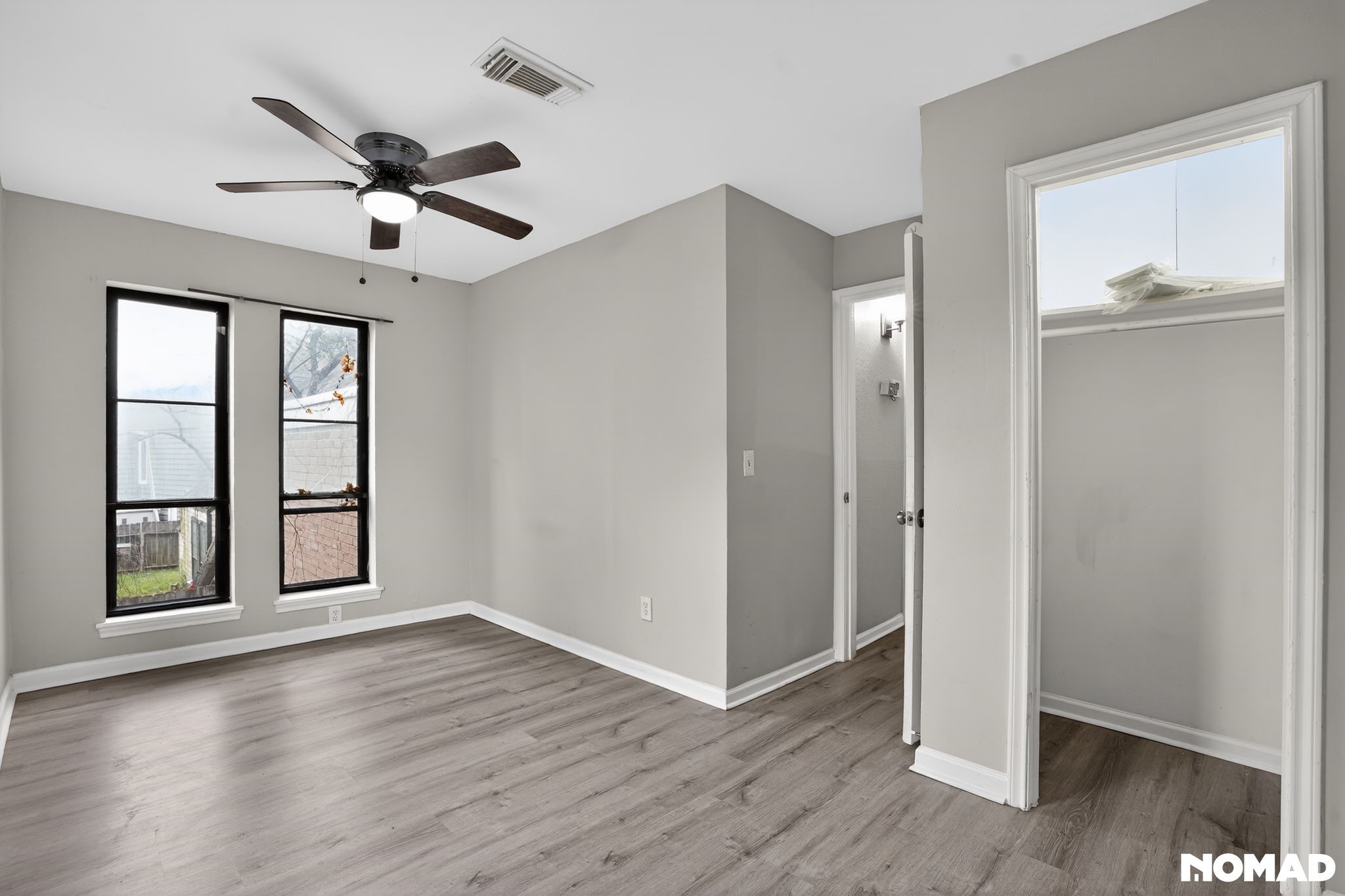 17805 Villa Way Drive Spring, TX 77379 - Photo 34 of 38 a view of an empty room with wooden floor and a window