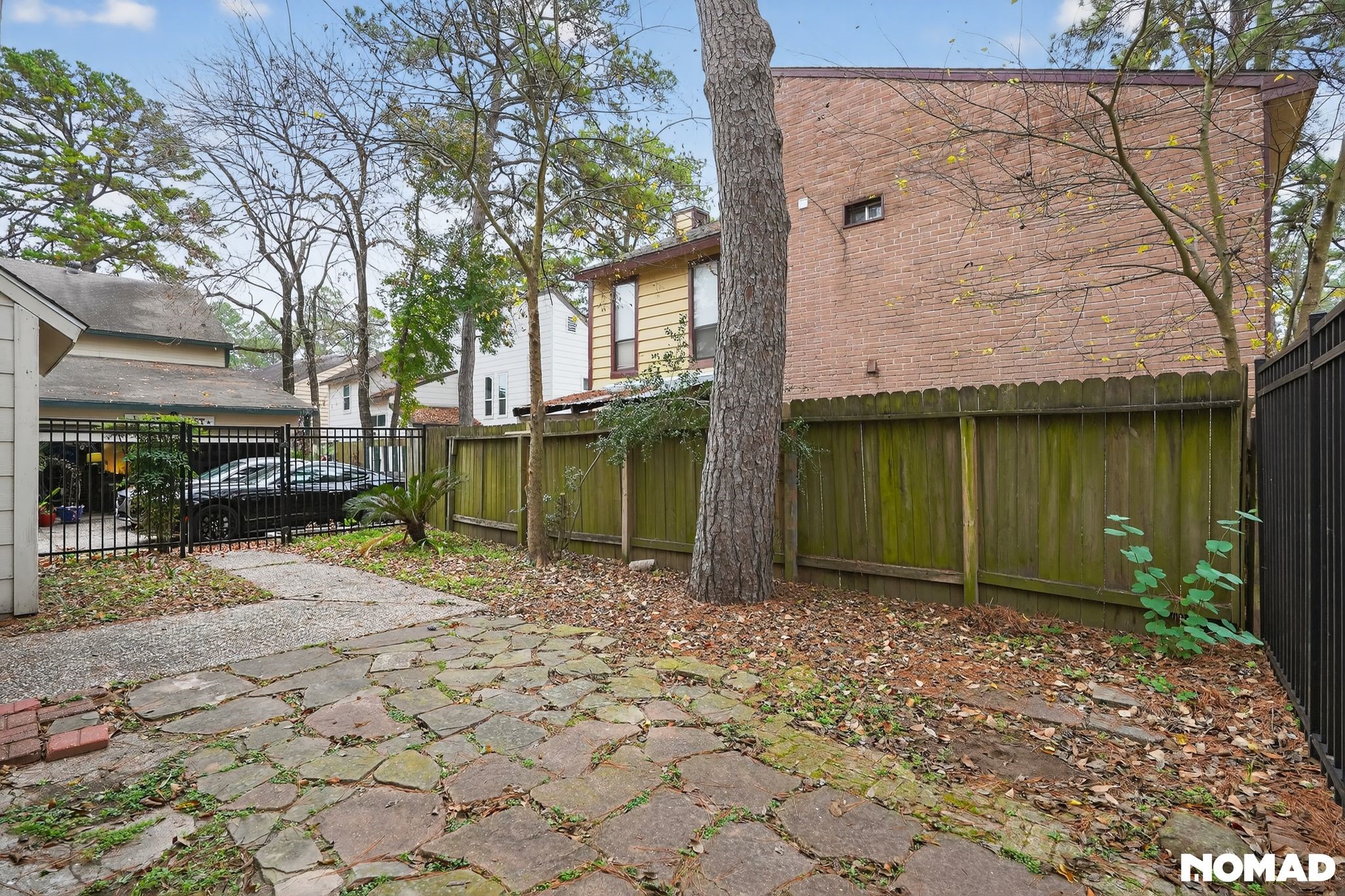 17805 Villa Way Drive Spring, TX 77379 - Photo 36 of 38 a view of a backyard with a tree
